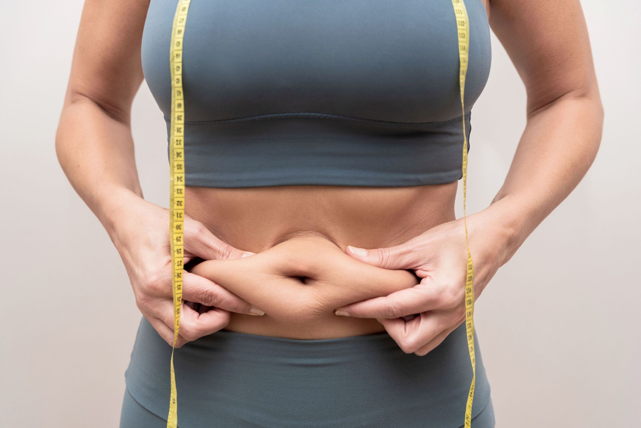 Liposuction: belly fat pinch