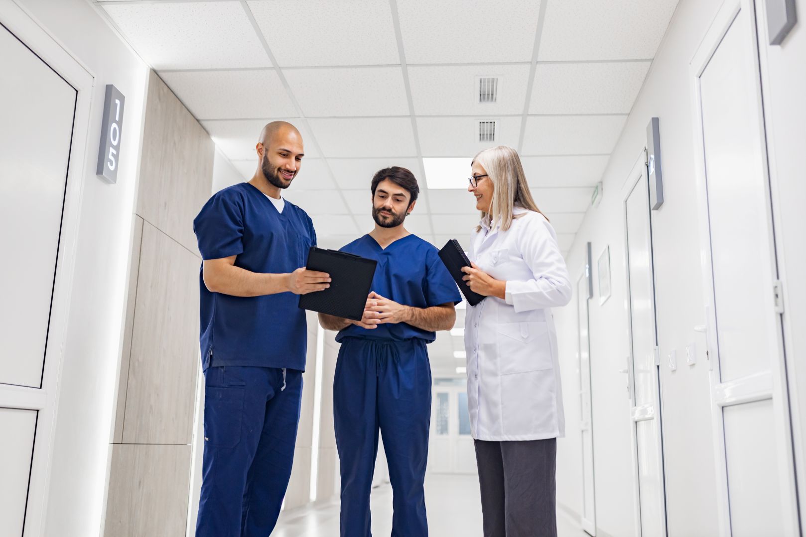 Medical team in an Istanbul hospital reviewing a patient file for plastic surgery in Turkey.